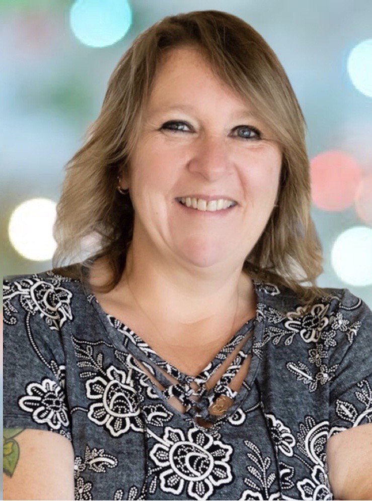 Portrait of Cathy Tokar, REALTOR®.