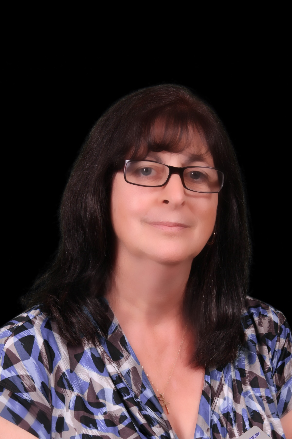 Portrait of Susan Flores, REALTOR®.